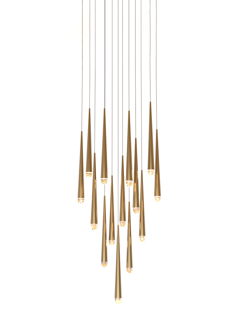 Close-up detail of the brushed brass finish on the individual metal cones of the cascade pendant light