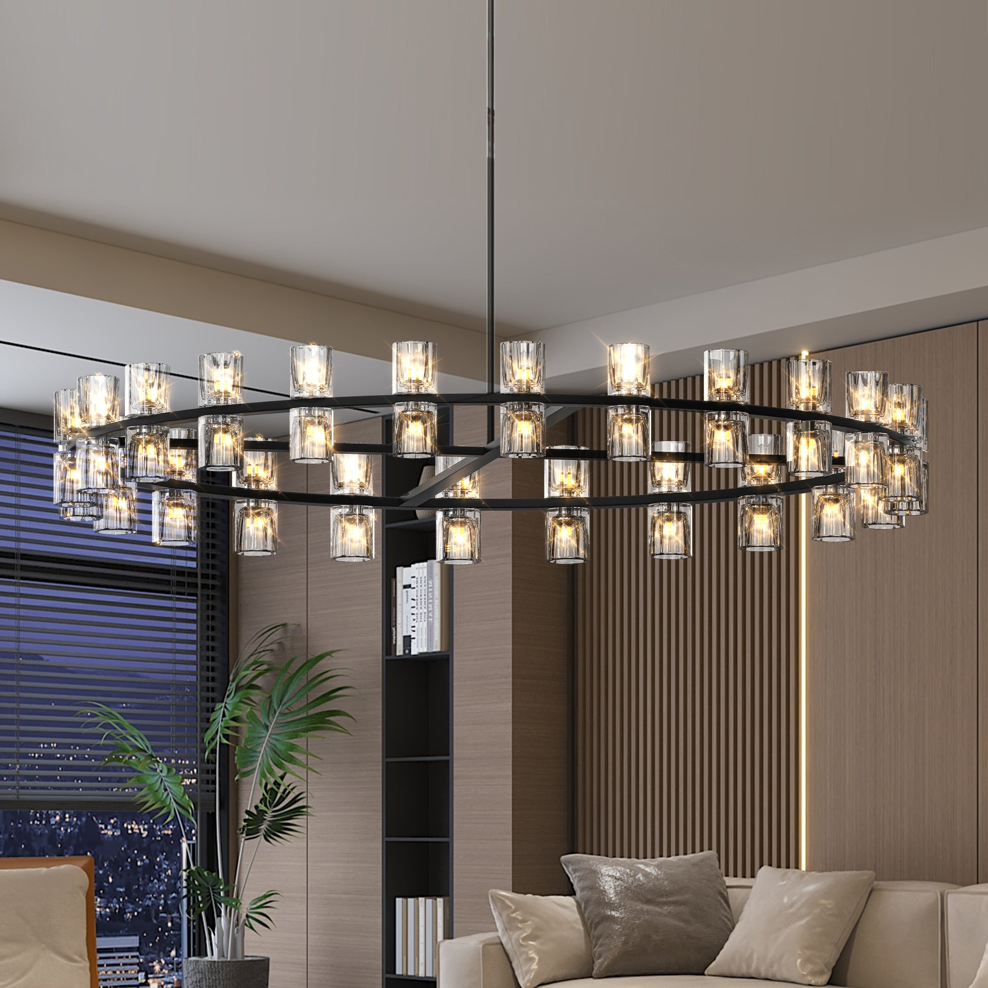 Modern chandelier hanging in a living room with a sofa and decorative pillows.