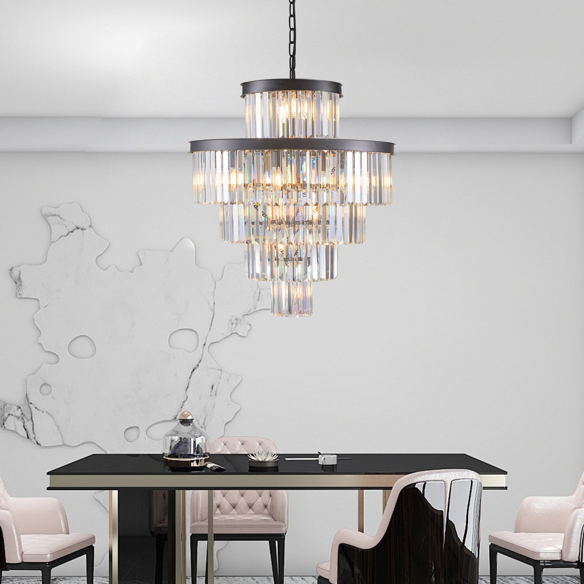 Modern chandelier hanging above a dining table in a stylish room.