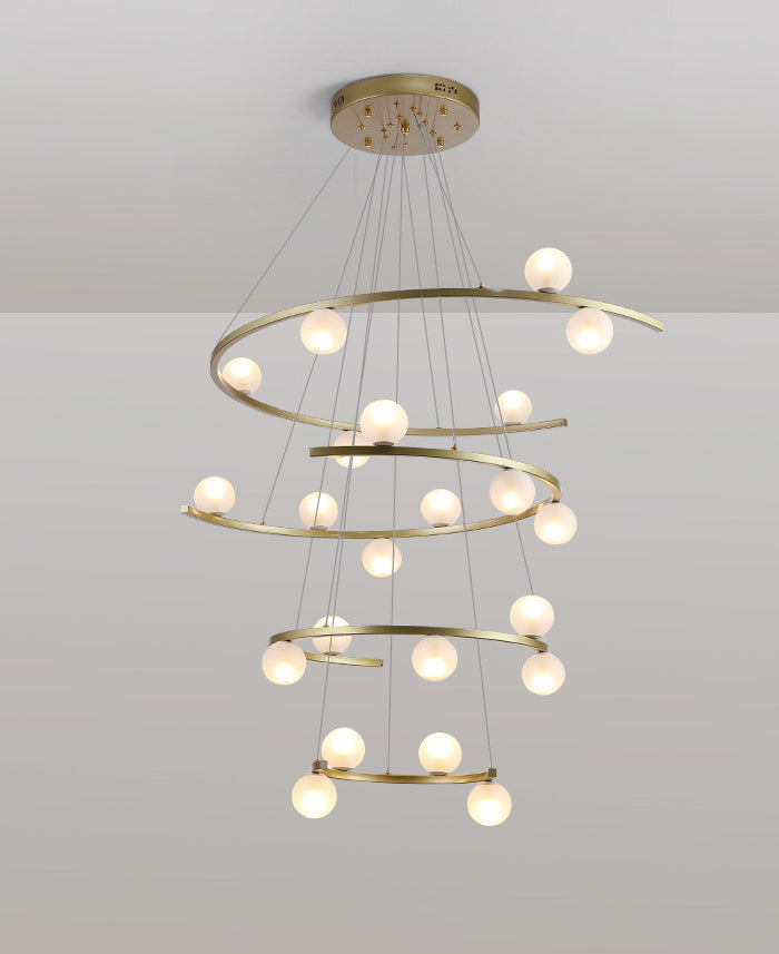 Aurorae Lighting Half Ring chandelier suspended over a modern kitchen island