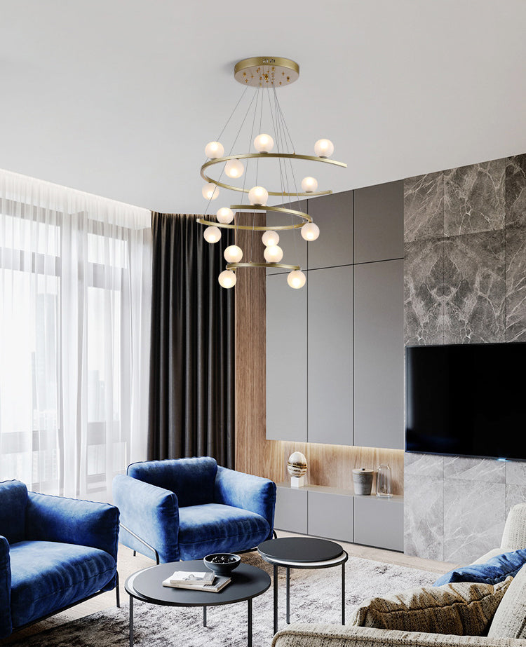 Energy-efficient Half Ring LED chandelier by Aurorae Lighting in a home office