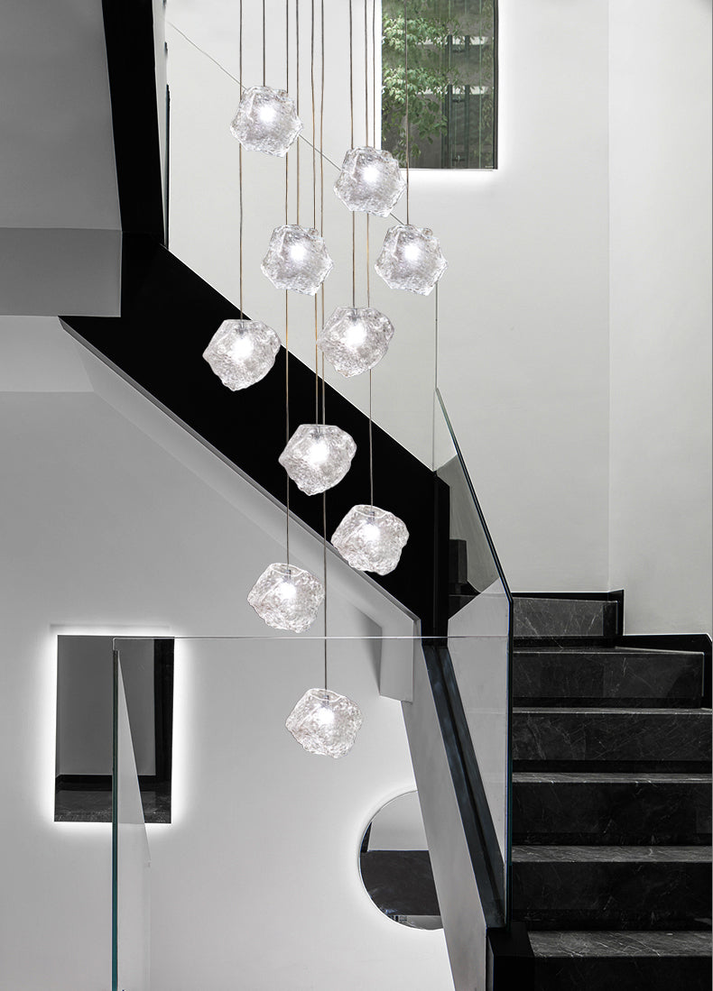 Unlit ice cube crystal pendant light displaying its pure geometric form and transparent quality