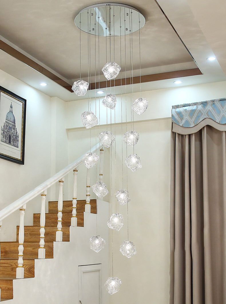 Detail view of the sleek suspension cord and ceiling canopy for the modern ice cube pendant light