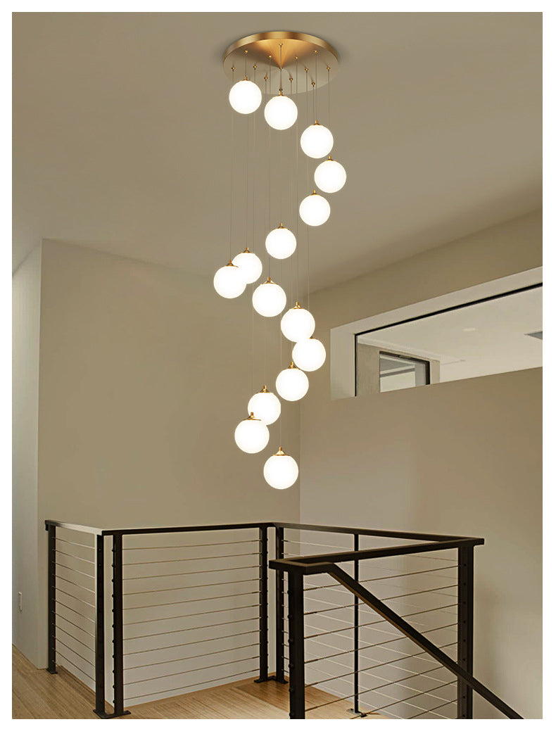 Underside view of the glowing milk white globe pendant light