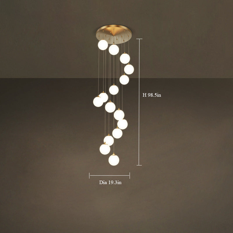 Milk white round hanging light casting warm illumination in a bedroom