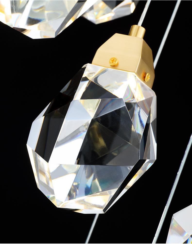 Close-up detail of K9 crystals on a modern crystal pendant light, exquisitely cut, radiating light, showcasing luxury texture.