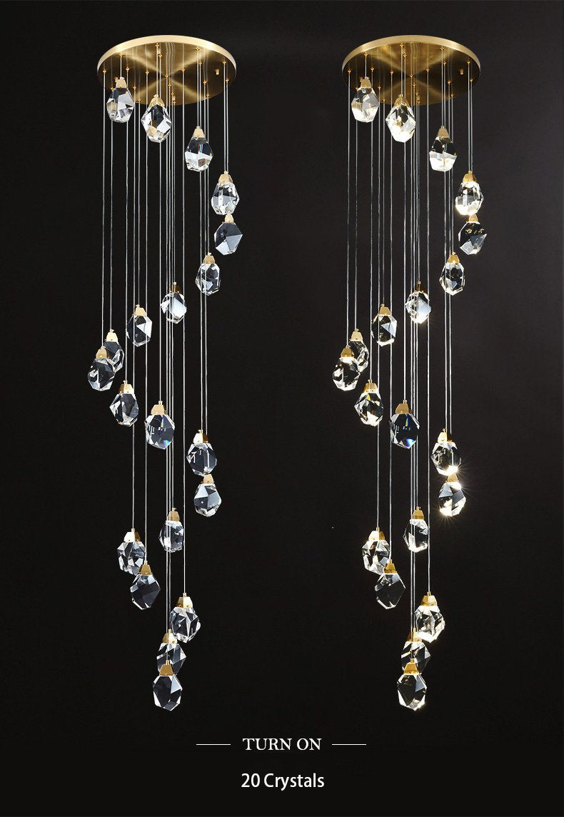 Foyer K9 crystal pendant light, illuminating the first glance home, Aurorae Lighting's modern design welcoming guests.
