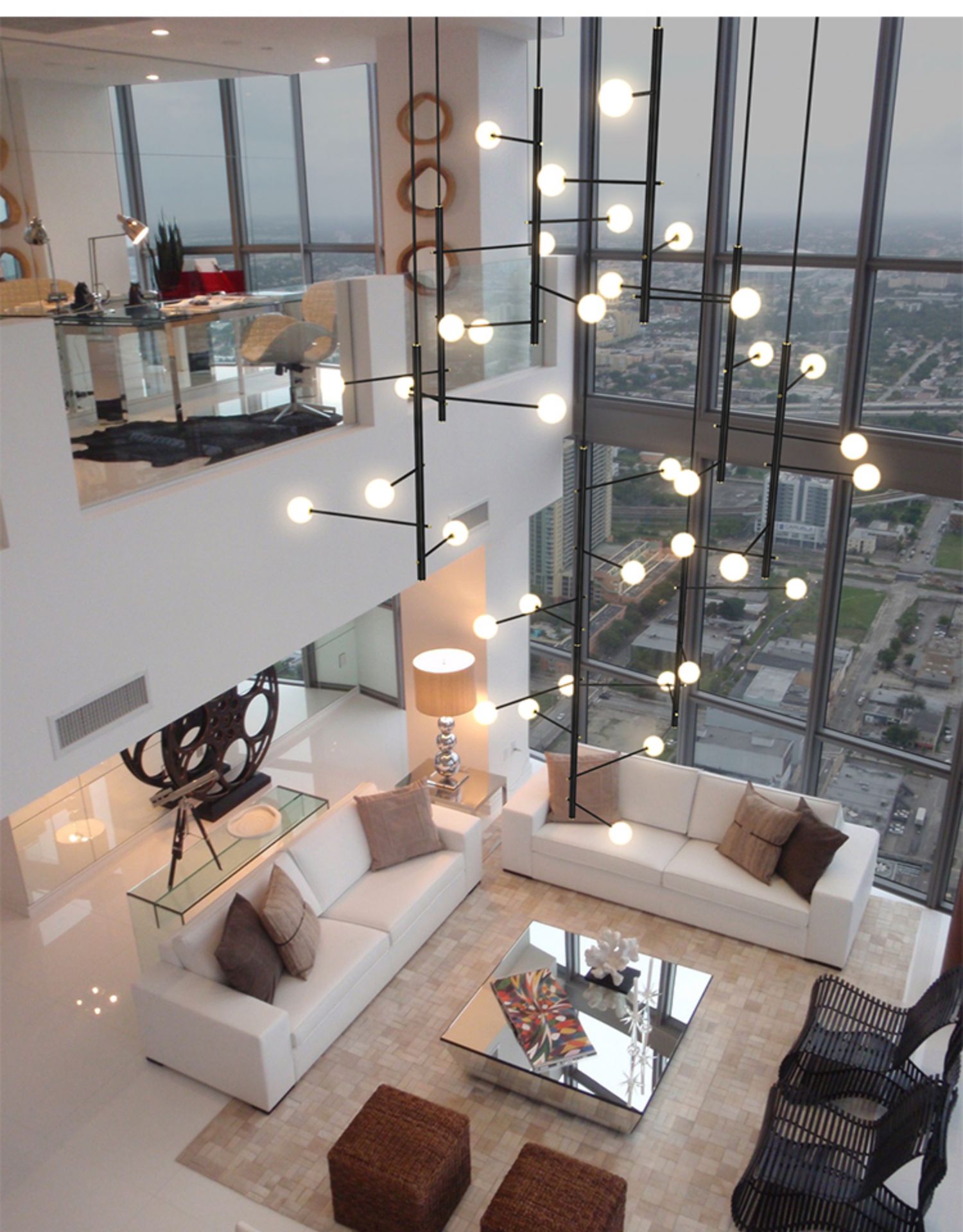 Overhead view of the black multi-arm opal glass chandelier in an elegant living room setting.