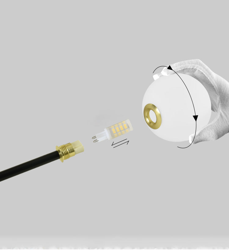 Close-up of the ceiling canopy for the multi-arm opal glass chandelier, showing wiring connections.