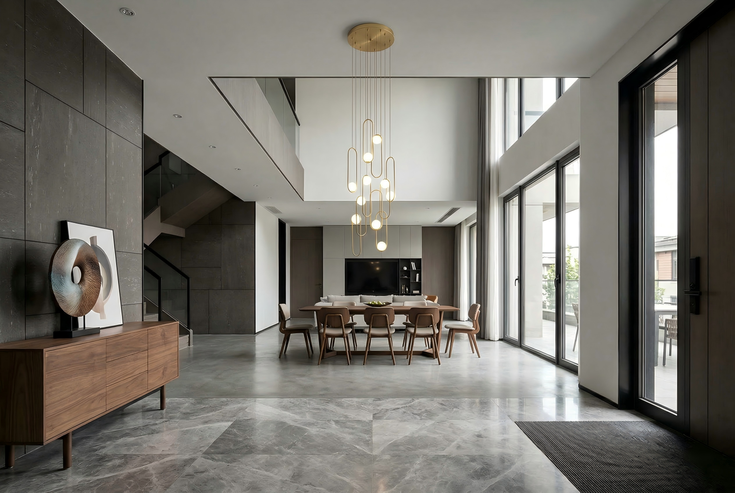 Chandelier installation cost guide showing electrician installing modern pendant light in dining room