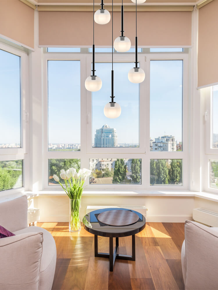 multi cream glass globe pendant lighting is hanging for living room